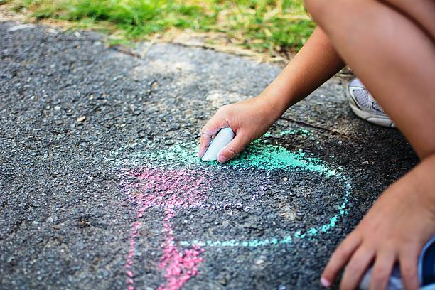 istock Children drawing in the park 479852424