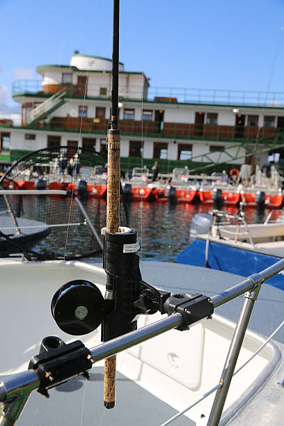 istock Fishing rod mounted on a boat railing 479854974
