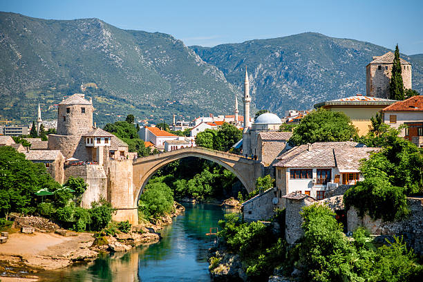 Mostar city view Beautiful view on Mostar city with old bridge and ancient buildings on Neretva river in Bosnia and Herzegovina stari most mostar stock pictures, royalty-free photos & images