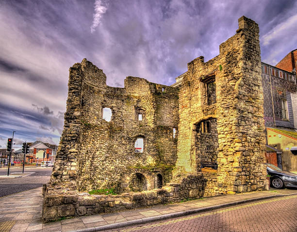 Conwy castle towers, Conwy, North Wales, UK, under a cloudy sky in the springtime.