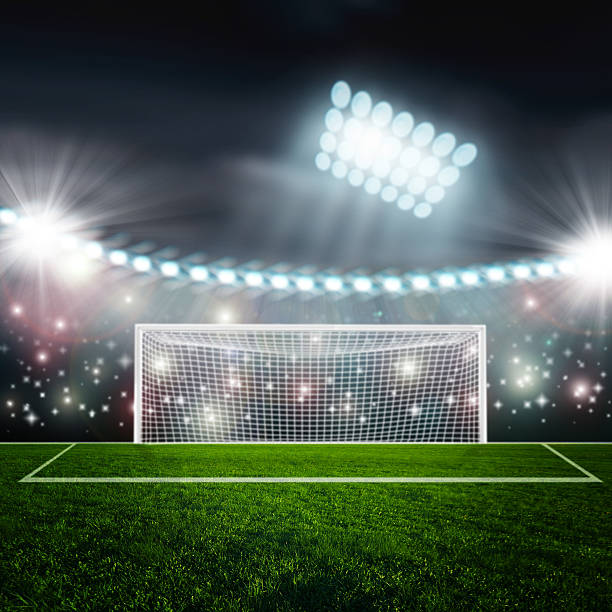 istock Soccer ball on green stadium arena 479863244