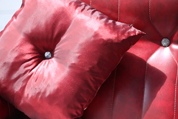 istock Burgundy satin cushion 479868038