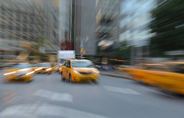 istock Purposely Blurred taxi cabs and vehicles in traffic 479870268