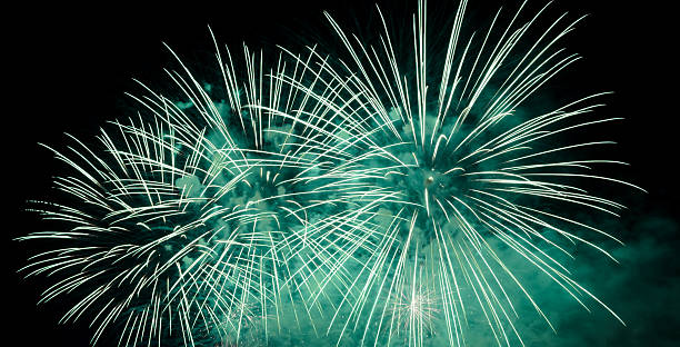 istock Green fireworks in the night sky 479870304