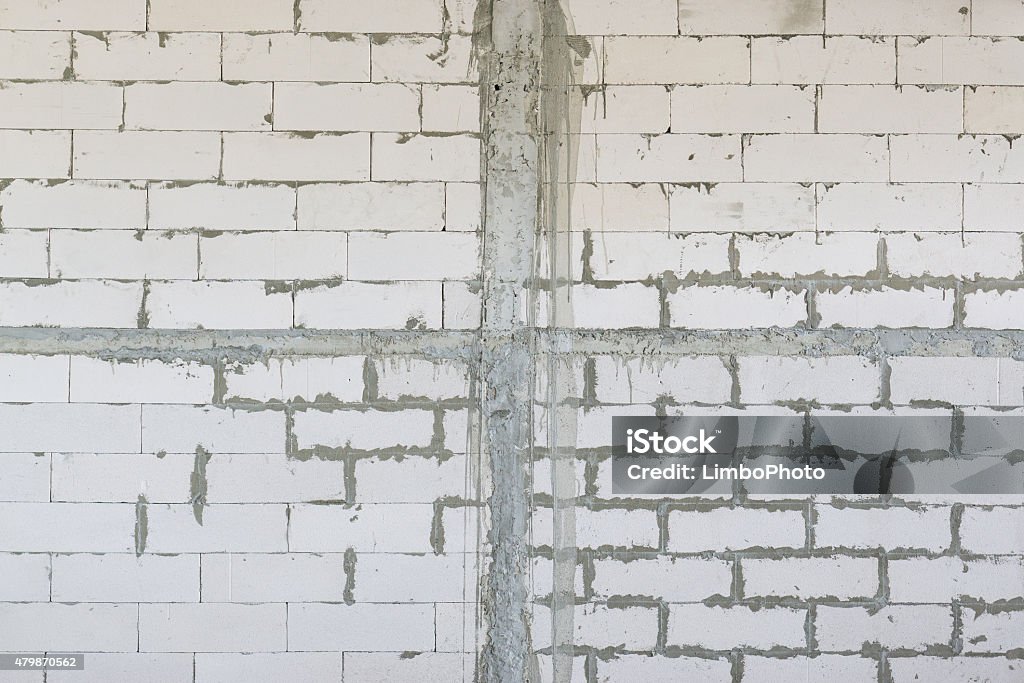 Unfinished concrete wall Unfinished concrete wall with cement 2015 Stock Photo