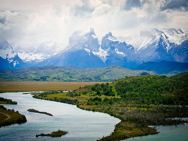 istock mountain landscape with river and rain clouds, south america 479873103