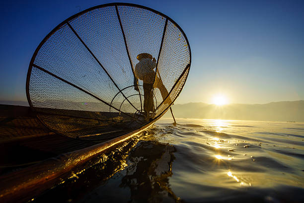 istock Fishermen in Inle Lake at sunrise, Shan State, Myanmar 479873113