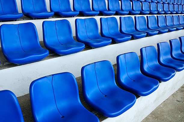 istock stadium seats at football stadium 479873408