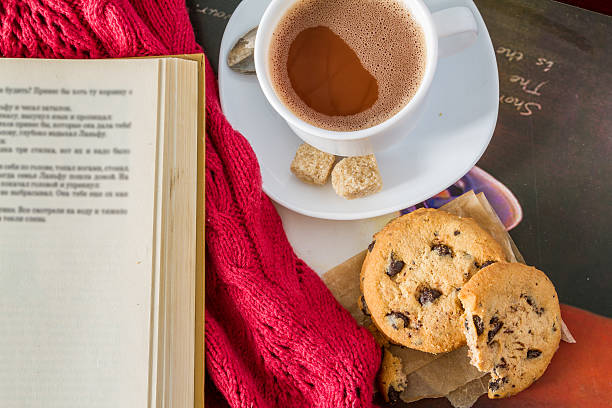istock Hot chocolate, knitted scarf, tray, rustic wood background 479873478
