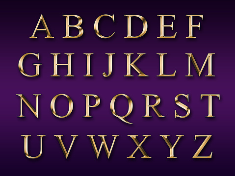 Golden alphabet on a purple background