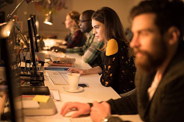 istock Young people sitting in the office and working on computers. 479876612