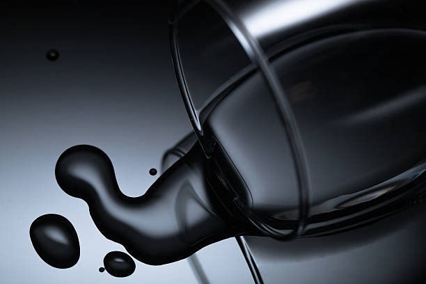 istock water flow from falling glass on black background 479881646