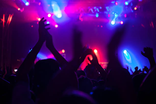 istock Cheering crowd having fun at a concert. 479882544