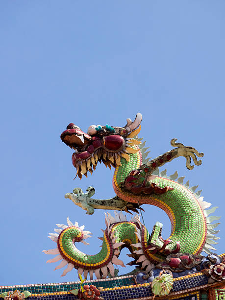 istock colorful chinese dragon and blue sky 479883266