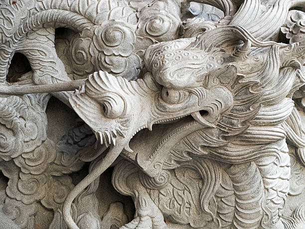 istock Chinese Dragon crafted on marble stone. 479884168