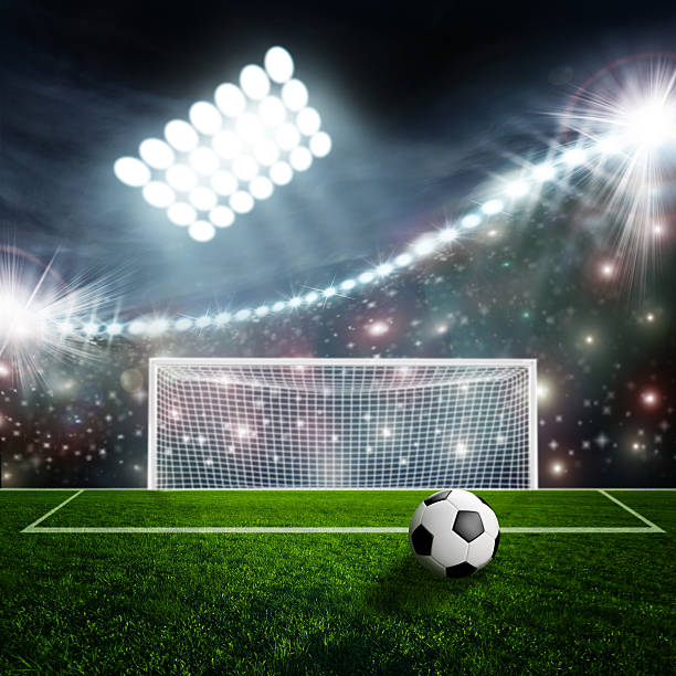 istock Soccer ball on green stadium arena 479886400