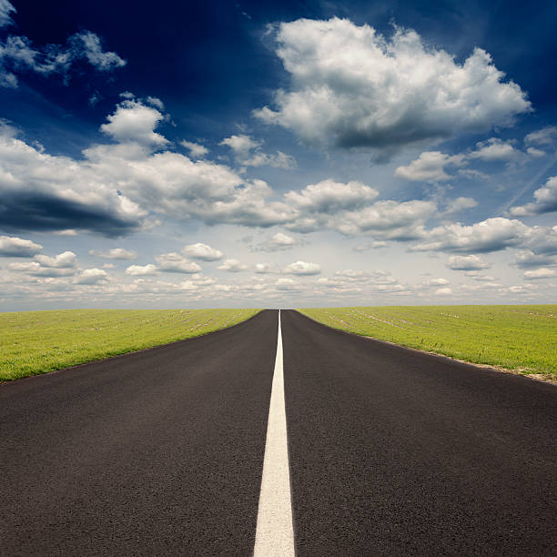 istock Driving on empty asphalt road at idyllic sunny day 479887320