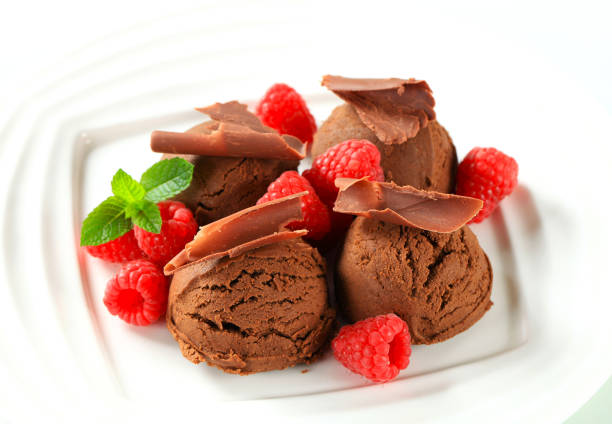 istock Chocolate almond ice cream with fresh raspberries 479888434