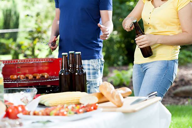 Friends making grill party in sunny day