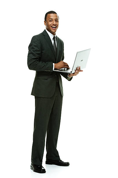 istock Smiling businessman working on laptop 479897664
