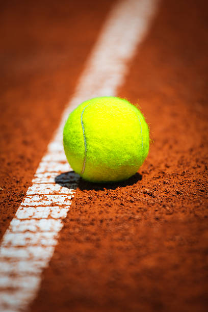 istock Tennis ball on clay court 479897992