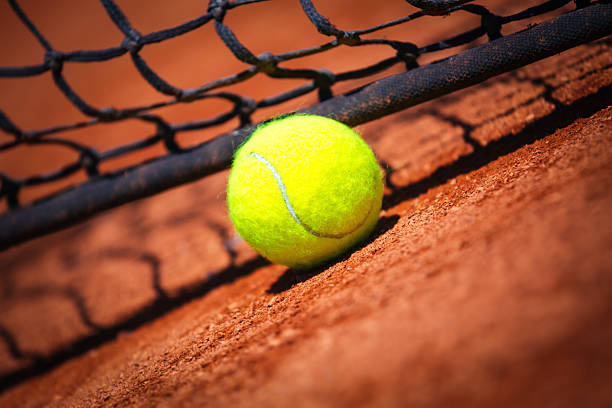 istock Tennis ball in net 479898428