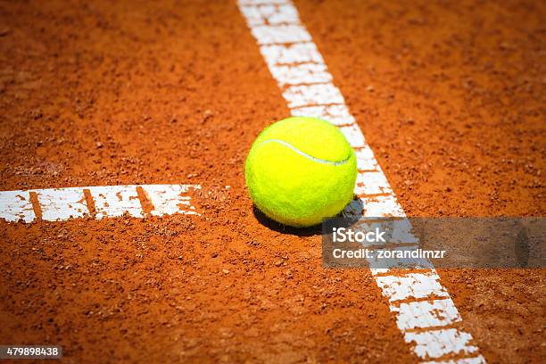 Tennis Ball On Clay Court Stock Photo - Download Image Now - 2015, Baseline, Clay Court