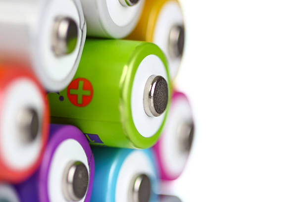 istock Several AA batteries in perspective closeup view on white backgr 479899778