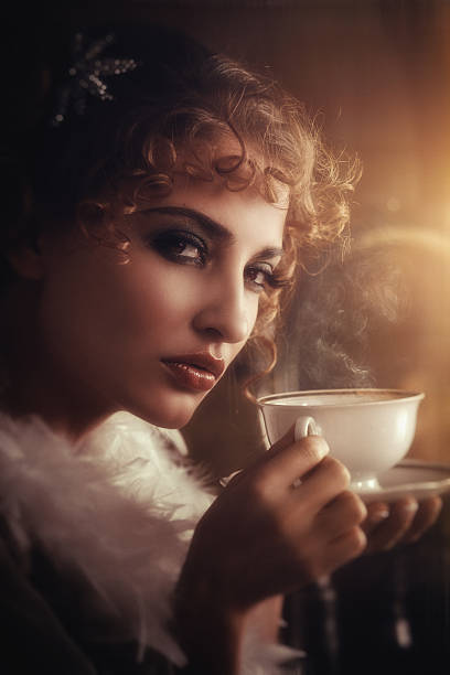 istock retro beauty drinking hot coffee 479900300