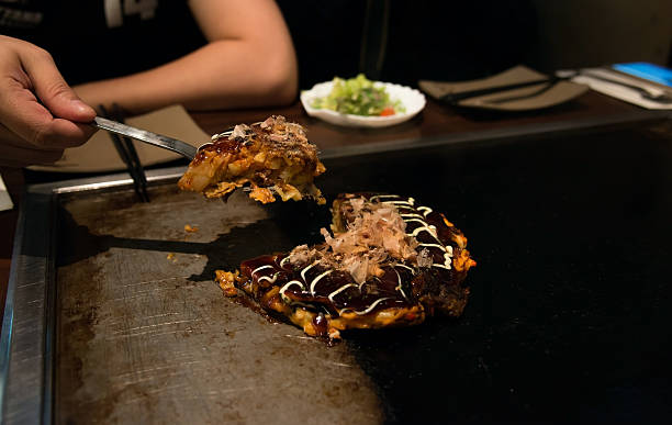 Okonomiyaki.(japenese pizza) Close up Okonomiyaki.(japenese pizza) takoyaki photos stock pictures, royalty-free photos & images
