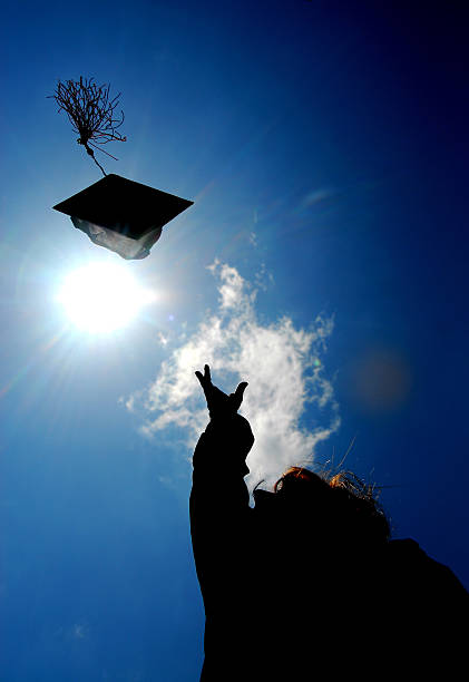 Graduate Cap Toss stock photo