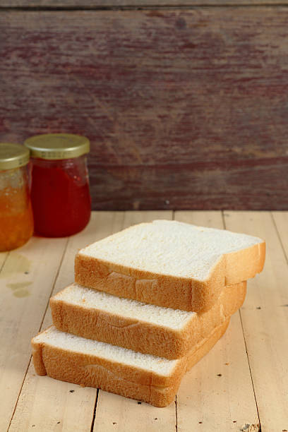 istock Sliced Bread on wood plank background. 479909358
