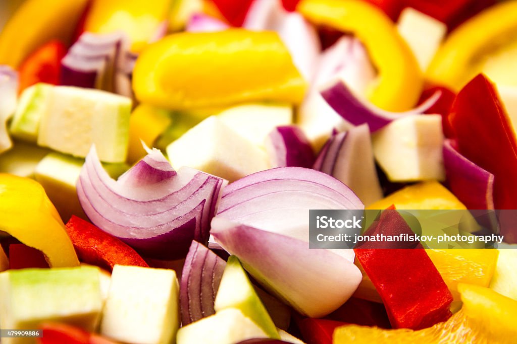 Red onion Delicious, chopped vegetables in multi colors: zucchini, pepper and red onion ready to be roasted 2015 Stock Photo
