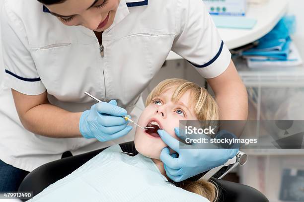 Little Girl On Dental Check Up Stock Photo - Download Image Now - 2015, Assistant, Chair