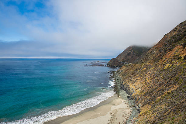 Bixby Creek Bridge, also known as Bixby Bridge, is a reinforced concrete open-spandrel arch bridge in Big Sur, California. The bridge is located 120 miles south of San Francisco and 13 miles south of Carmel in Monterey County along State Route 1.
