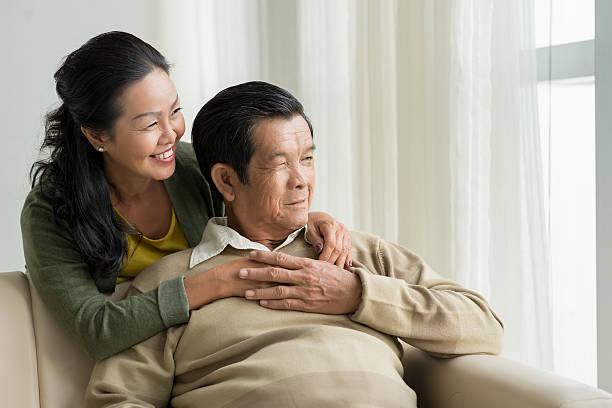 istock Mature Vietnamese couple at home 479916996