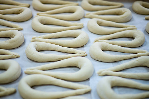 istock Fresh Pretzel or Brezel Dough on Wax Sheet 479921984