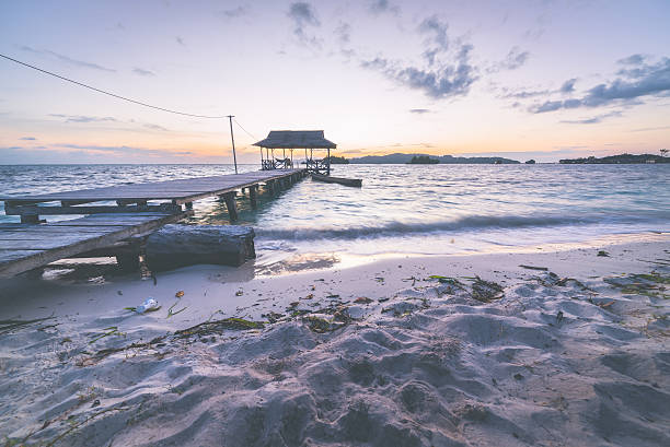 istock Tourist beach resort at dawn, marsala toned image 479924450