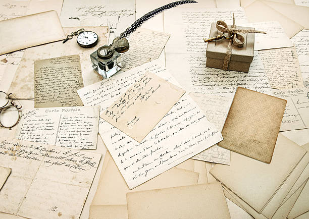 istock old letters, vintage postcards and antique feather pen 479929237