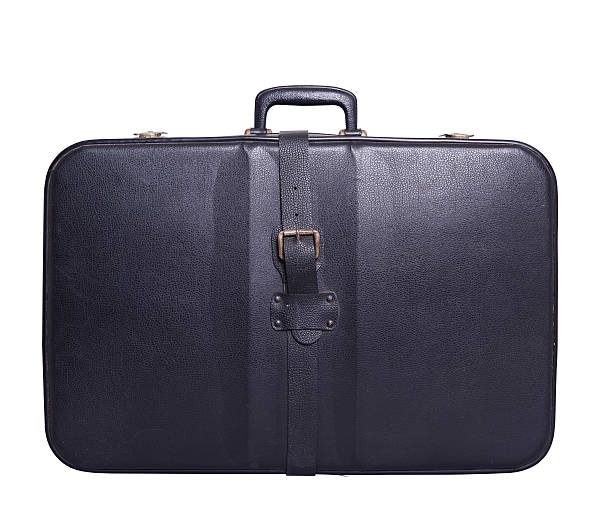 istock Vintage black leather travel bag isolated on white 479941563