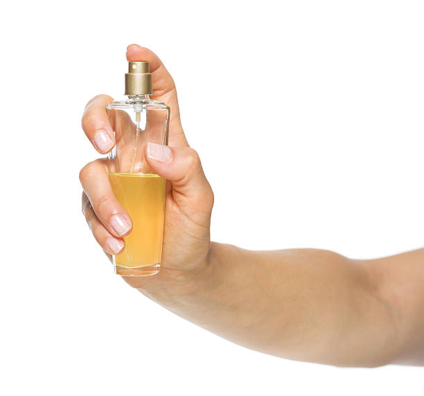 istock closeup on woman hand applying perfume 479951091