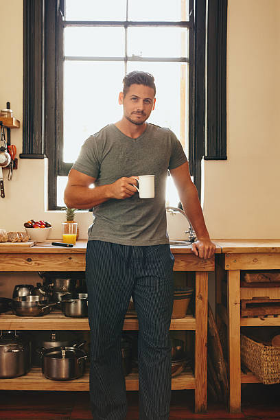 istock Young man having refreshing coffee in morning 479951134