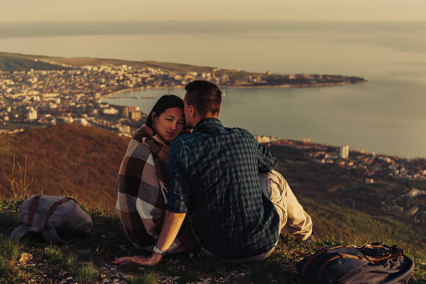 istock Loving couple resting outdoor at sunset 479951462