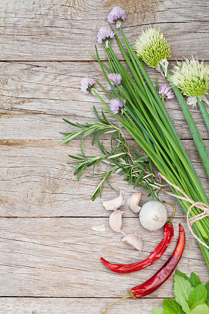 istock Fresh herbs and spices on garden table 479952364