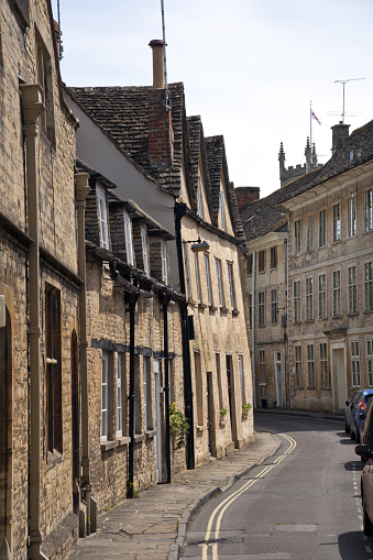 Quaint and historic buildings line the streets in the older parts of Cirencester, Gloucestershire, UK