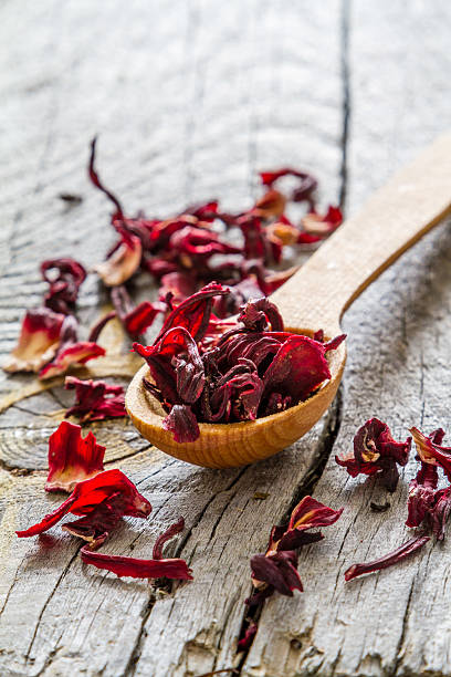 istock Dry hibiscus tea in wood spoon 479959248