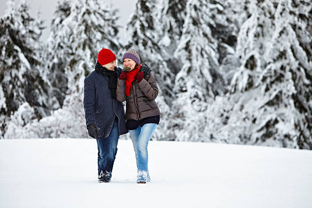 istock Couple Man Woman snow walk joy 479959770