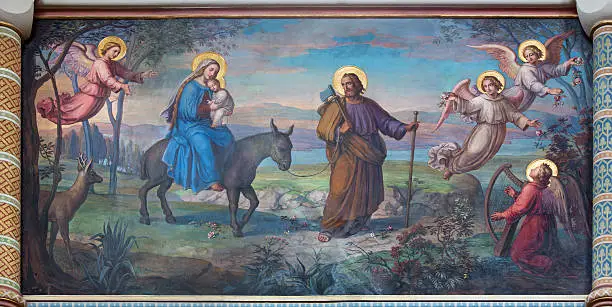Vienna -  Flight of holy family to Egypt fresco by Josef Kastner from 19. cent. in Carmelites church in Dobling.