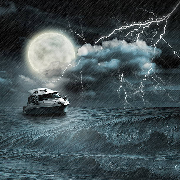 istock Boat in storm  evening on ocean and the moon 479965273