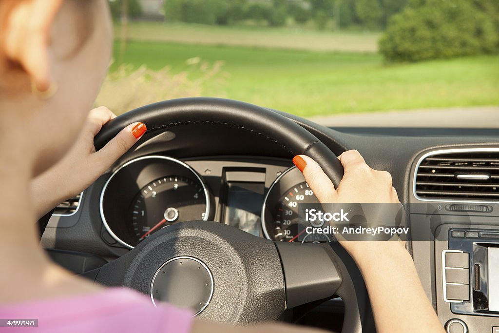 Young Woman In Car Photo of Happy Young Woman Driving The Car Car Stock Photo